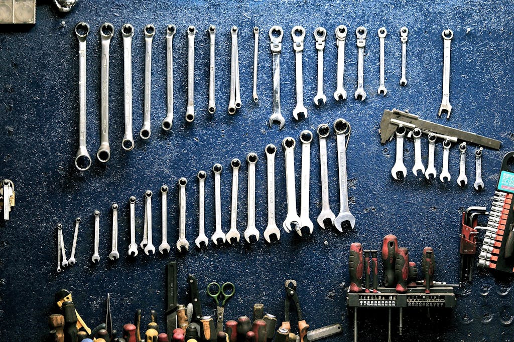Tools displayed in garage in preparation of garage door tune up.