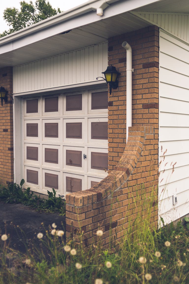 Older home with unique panel garage door