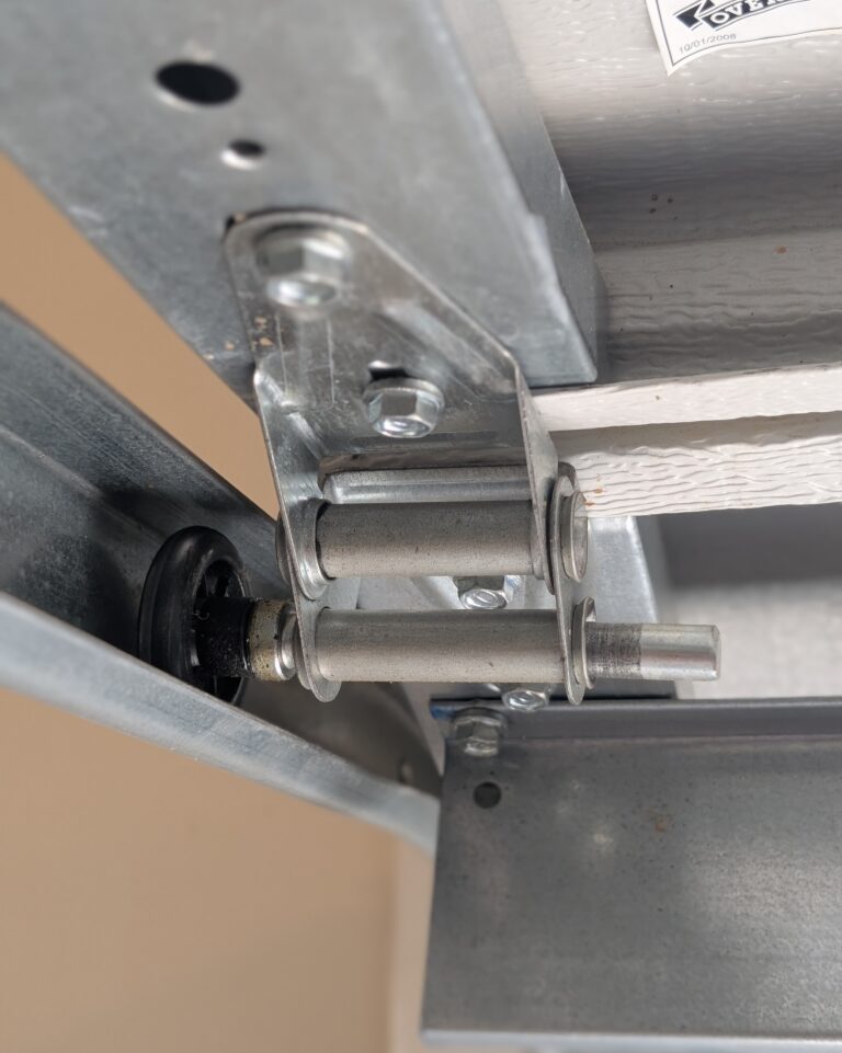 Garage door rollers and track, white aluminum garage door