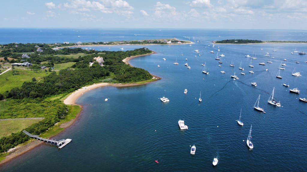 Scenic aerial view of boats anchored along the coastline near New Shoreham, Rhode Island.